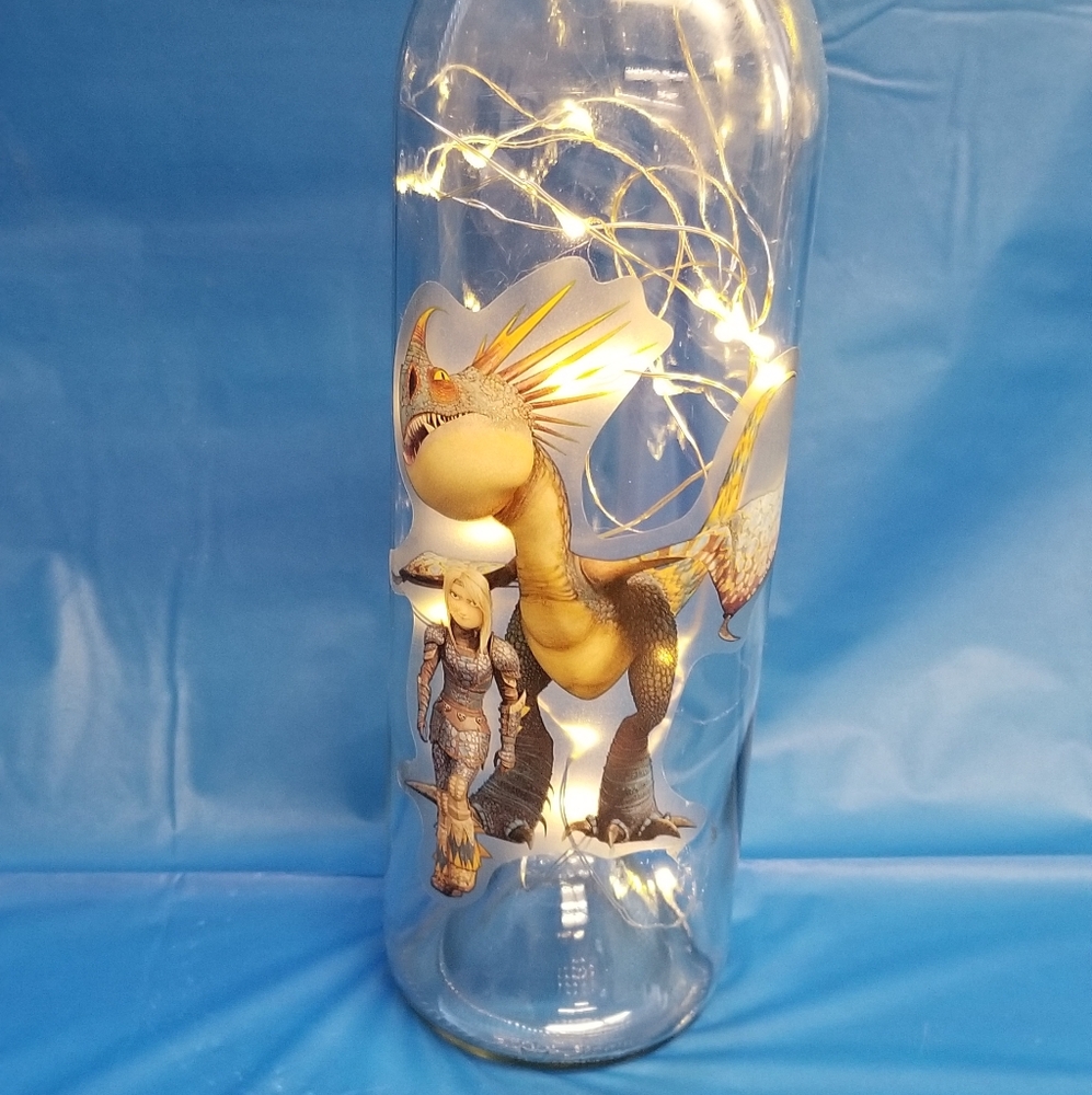 Lighted Astrid and Stormfly wine bottle